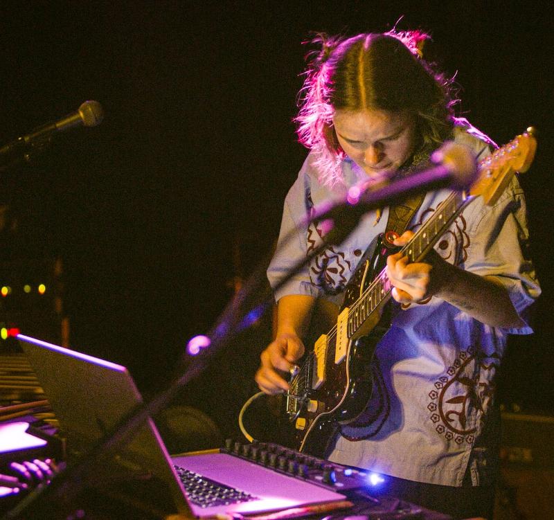 Foto av Mie med gitar